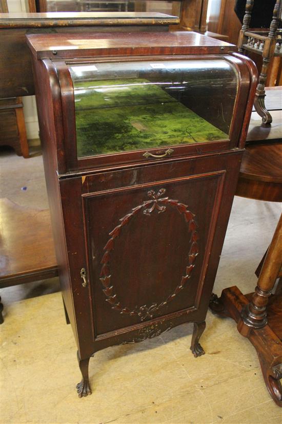 A 1920s patent mahogany music cabinet